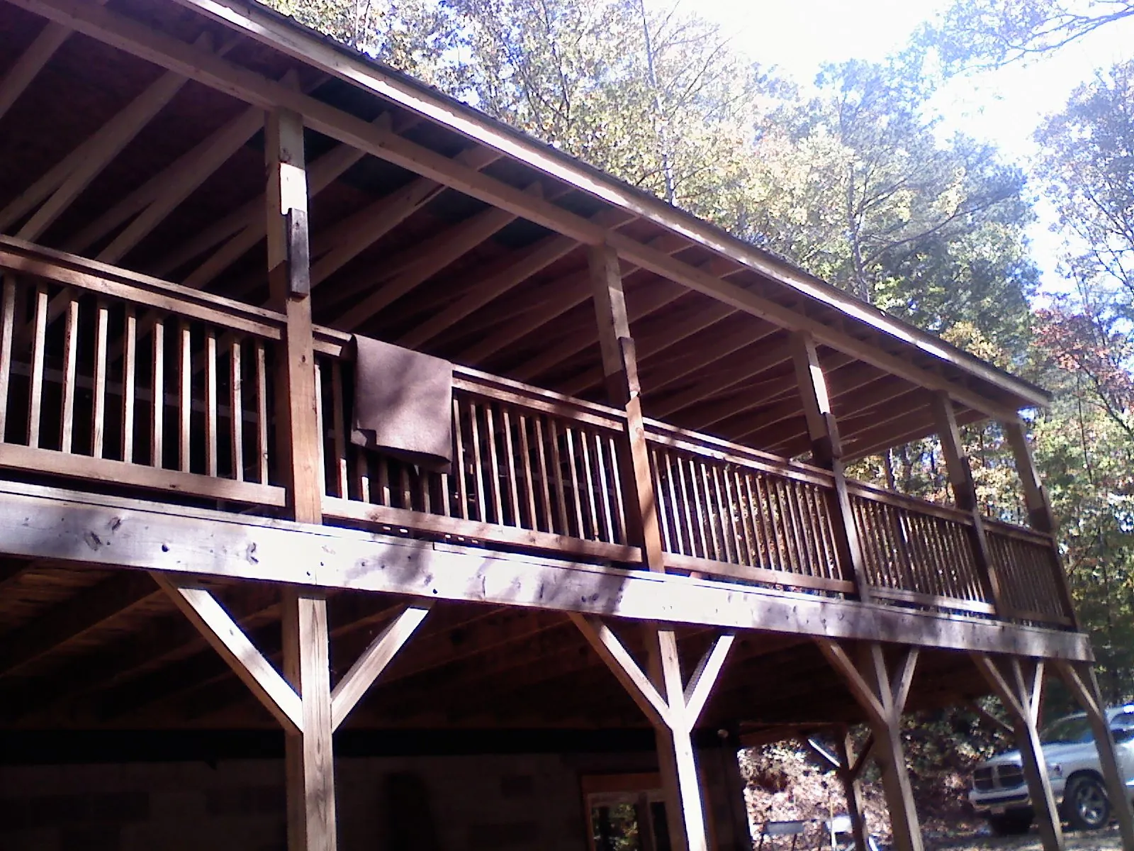 Timber framing under a new elevated porch and deck — Roof Leak Repair in Ramsey by Roofing Brothers